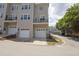Townhome with three-car garage, balconies, and street view at 441 Heritage Village Ln, Apex, NC 27502
