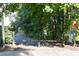 Beautiful paved walking trail at Beaver Creek surrounded by mature trees and lush greenery at 441 Heritage Village Ln, Apex, NC 27502