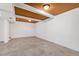 Spacious basement with paneled ceiling, recessed lighting and tile floors at 4906 Lakemont Dr, Raleigh, NC 27609