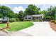Charming single-story home with manicured lawn and inviting curb appeal at 4906 Lakemont Dr, Raleigh, NC 27609