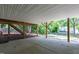 Covered patio area with concrete flooring and views of the backyard at 4906 Lakemont Dr, Raleigh, NC 27609