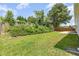 Spacious backyard featuring a lawn area and a private, wooded perimeter at 503 Kinship Ln, Apex, NC 27502