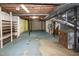 Basement with storage shelves at 5213 Tomahawk Trl, Raleigh, NC 27610