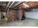 Basement featuring a brick fireplace at 5213 Tomahawk Trl, Raleigh, NC 27610