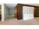 Spacious living room with built in shelving and hardwood features at 5213 Tomahawk Trl, Raleigh, NC 27610