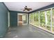 Spacious screened porch leading indoors, offering seamless indoor-outdoor living at 5213 Tomahawk Trl, Raleigh, NC 27610