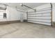 Large garage with overhead door and concrete block foundation at 565 Joseph Alexander Dr, Fuquay Varina, NC 27526