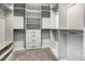 Organized walk-in closet with shelves, drawers, and hanging rods at 565 Joseph Alexander Dr, Fuquay Varina, NC 27526