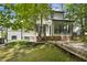 A beautiful backyard with a charming deck, ideal for enjoying outdoor living and entertaining guests at 5704 Cholderton Ct, Raleigh, NC 27604