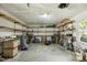 Spacious garage with abundant shelving, providing ample storage solutions at 5704 Cholderton Ct, Raleigh, NC 27604