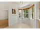 Cozy kitchen nook with large bay window for natural light and views of the surrounding landscape at 5704 Cholderton Ct, Raleigh, NC 27604