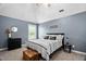 Cozy bedroom with soft carpet, window view, and neutral decor at 60 Morning Mist Dr, Garner, NC 27529