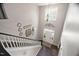 A birds eye view of the front entrance, showing the beautiful hardwood flooring and stylish chandelier at 60 Morning Mist Dr, Garner, NC 27529