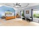 Spacious main bedroom with tray ceiling, plush carpet, and large windows at 60 Morning Mist Dr, Garner, NC 27529
