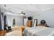 Relaxing main bedroom featuring tray ceiling and ample natural light at 60 Morning Mist Dr, Garner, NC 27529