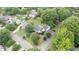 An aerial view of a home with well-manicured lawn and neighborhood amenities at 600 Driftwood Dr, Gibsonville, NC 27249