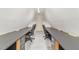 Finished attic space features built-in desks and plenty of room for a home office or creative workspace at 600 Driftwood Dr, Gibsonville, NC 27249