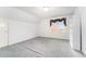 Bedroom featuring grey carpet, a window with drapes, a closet and views of the neighborhood at 600 Driftwood Dr, Gibsonville, NC 27249