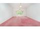 Large, open bedroom with soft pink carpeting and a charming window nook at 600 Driftwood Dr, Gibsonville, NC 27249