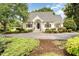 Charming one story brick home with a landscaped yard and driveway at 600 Driftwood Dr, Gibsonville, NC 27249