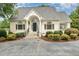 Charming one story brick home with a landscaped yard and driveway at 600 Driftwood Dr, Gibsonville, NC 27249