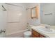 Bathroom showcases a vanity, mirror, toilet, and shower-tub combo at 6540 English Oaks Dr, Raleigh, NC 27615