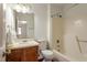 Bathroom featuring a vanity, mirror, toilet, and shower-tub combo with essential fixtures at 6540 English Oaks Dr, Raleigh, NC 27615
