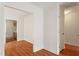 Bright dining area with wood floors and access to the kitchen at 6540 English Oaks Dr, Raleigh, NC 27615
