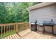 Spacious back deck with multiple grills, perfect for outdoor cooking and entertaining at 68 Tanners Way, Clayton, NC 27527