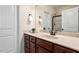 Bathroom features a large vanity with a sink, a mirror, and a glass-enclosed shower at 68 Tanners Way, Clayton, NC 27527