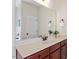 Bathroom vanity features a large mirror and ample counter space, providing functionality at 68 Tanners Way, Clayton, NC 27527