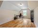 Bedroom featuring hardwood floors and a desk with a chair, ideal for a home office setup at 68 Tanners Way, Clayton, NC 27527