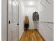 Walk-in closet with built-in shelving providing ample storage for an organized wardrobe at 68 Tanners Way, Clayton, NC 27527