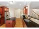 Spacious open kitchen with stainless steel appliances, granite countertops, kitchen island and lots of storage at 68 Tanners Way, Clayton, NC 27527