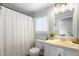 Bathroom featuring a vanity and shower and a view into the primary bedroom at 724 Harolds Northfield Dr, Cedar Grove, NC 27231