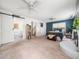 Bright and spacious primary bedroom featuring hardwood floors, ample closet space and natural light at 7605 Copper Mine Ln, Raleigh, NC 27615