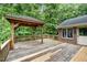Wooden deck and covered gazebo perfect for outdoor entertaining at 7801 Wood Way Ct, Raleigh, NC 27606
