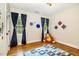 bedroom featuring hardwood floors and ample natural light at 7801 Wood Way Ct, Raleigh, NC 27606