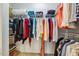 Walk-in closet with organized shelving and hanging space for clothing and accessories at 9 Lake Village Dr, Durham, NC 27713
