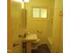Bathroom featuring a vintage sink, toilet, tub, and tile at 912 Dixie Trl, Raleigh, NC 27607
