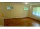 Cozy bedroom with beautiful hardwood floors and natural light, offering a comfortable retreat at 912 Dixie Trl, Raleigh, NC 27607