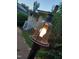 Outdoor shot showcasing a lantern-style yard light on a wooden post, adding ambiance to the home at 912 Dixie Trl, Raleigh, NC 27607