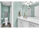 Clean bathroom with vanity, mirror, and neutral color scheme, providing a refreshing space at 921 Riverwood Dr, Clayton, NC 27527