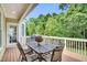 Outdoor deck with patio furniture, offering a relaxing space for outdoor dining and entertaining at 921 Riverwood Dr, Clayton, NC 27527