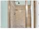 A walk-in shower with a tiled surround and a modern showerhead, showcasing a clean and functional design at 921 Riverwood Dr, Clayton, NC 27527