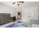 Guest bedroom featuring dresser, desk, and closet at 101 Eden Glen Dr, Holly Springs, NC 27540