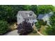 Beautifully landscaped two-story home with a well-maintained front yard and a welcoming entrance at 101 Eden Glen Dr, Holly Springs, NC 27540