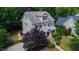 Charming two-story home with beautifully landscaped yard and a welcoming front porch at 101 Eden Glen Dr, Holly Springs, NC 27540