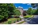 Charming home with a well-kept yard, mature trees, and a convenient two-car garage at 101 Eden Glen Dr, Holly Springs, NC 27540