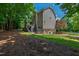 Charming two-story home with a walkout basement, beautiful landscaping, and a spacious backyard at 101 Eden Glen Dr, Holly Springs, NC 27540